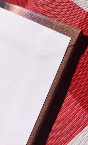 Closeup detail of laminate bookcover binding