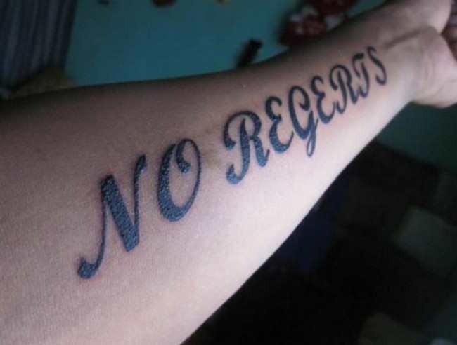 “No Regerts” tattoo