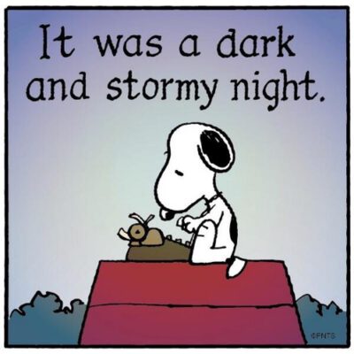 Snoopy typing on top of doghouse, with words, “It was a dark and stormy night”