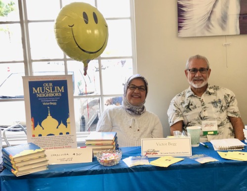 Victor Begg selling his book ‘Our Muslim Neighbors’ with wife Shahina